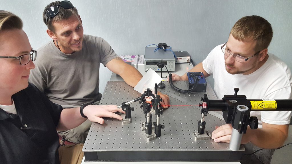 Baker College students perform experiment in photonics lab, Flint, MI