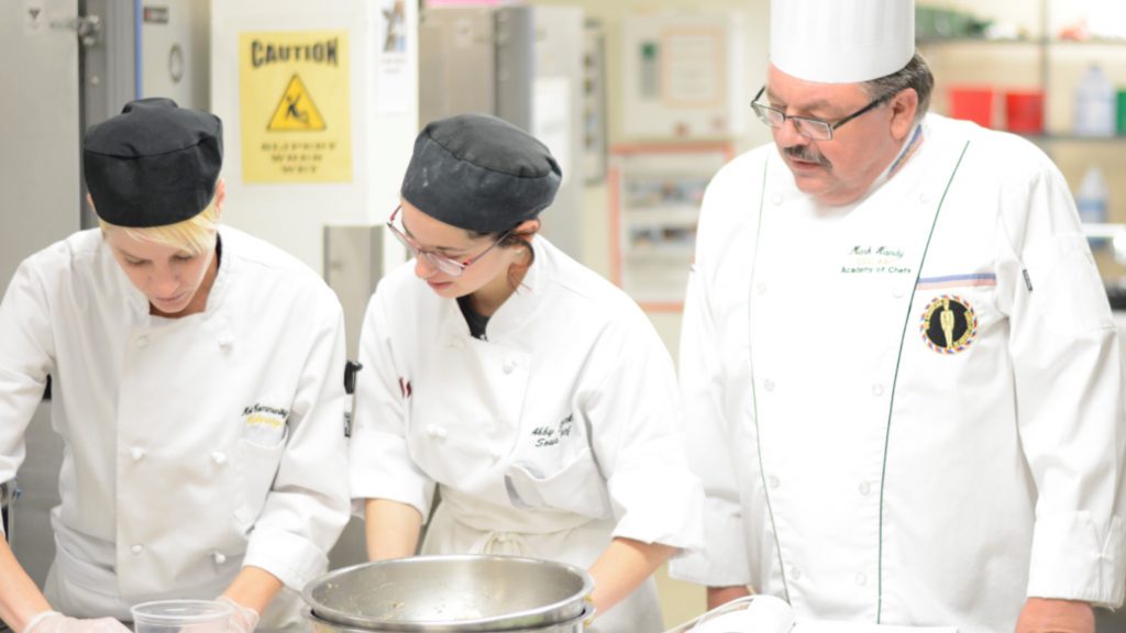 Students learn culinary techniques at Mott Community College Culinary Institute