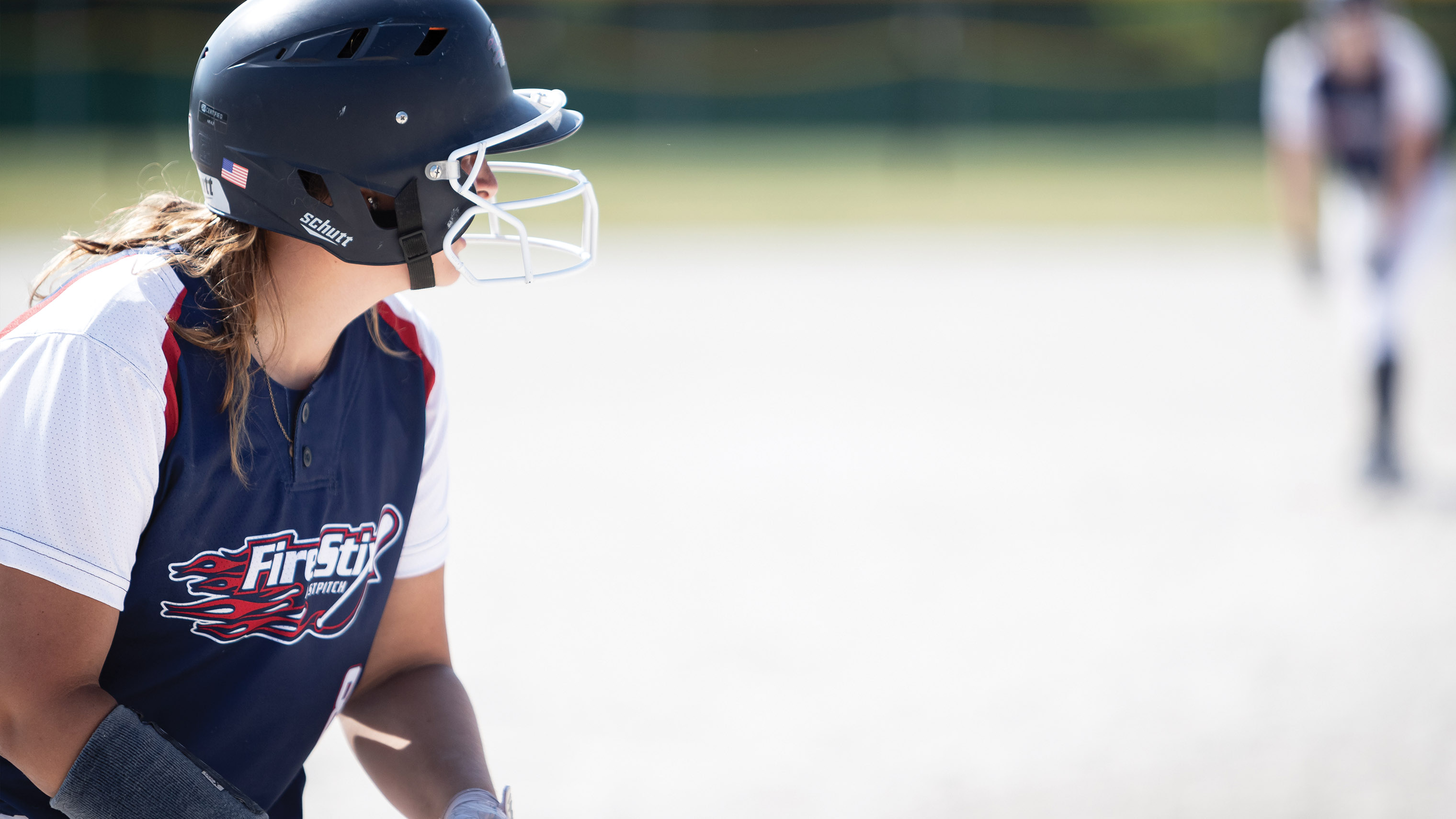 FireStix softball player is ready at 3rd base