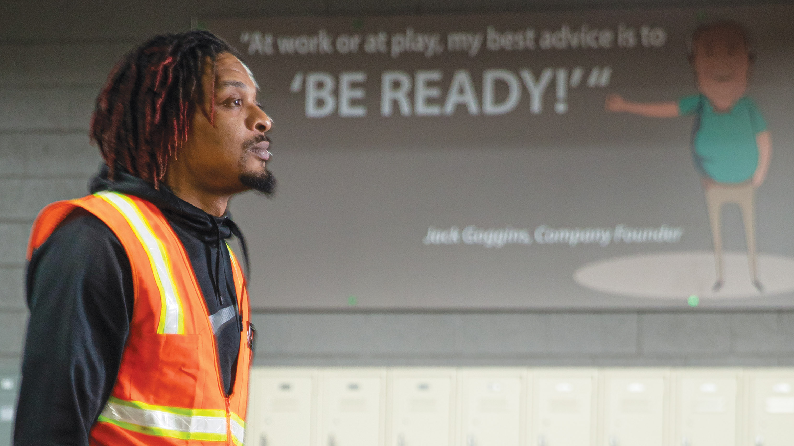 NorthGate employee walks by 'Be Ready' program sign