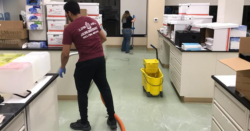 ClearView employees clean and disinfect floors