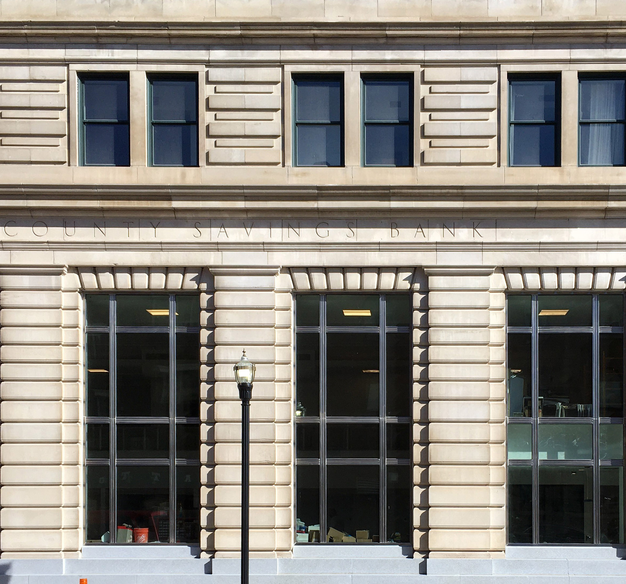 Outside of Hilton Garden Inn, a former bank building