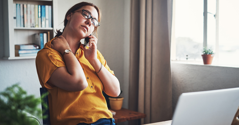 A woman stressed while working from home