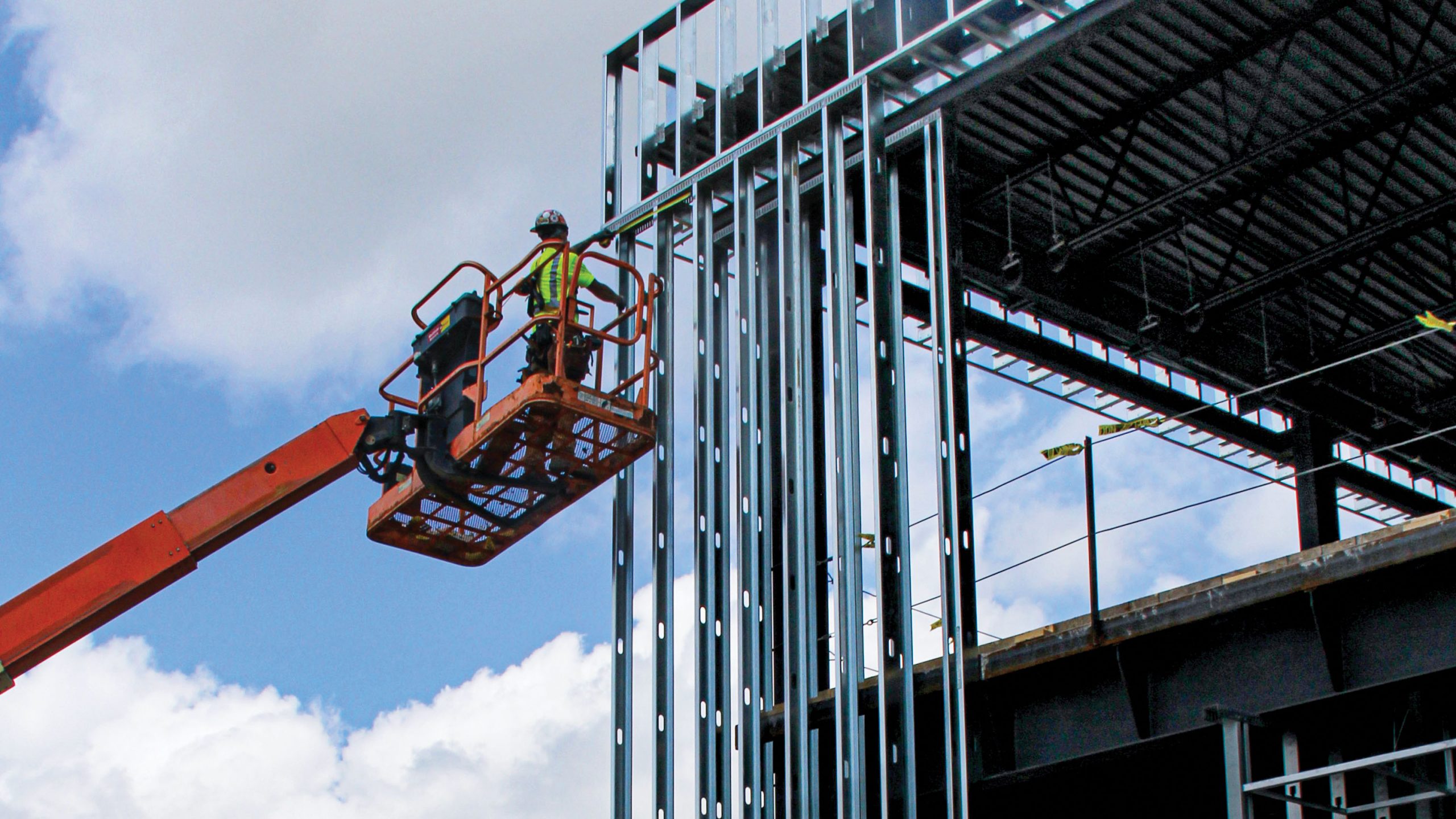 Skilled tradesmen work on the construction site of ELGA Credit Union's new headquarters