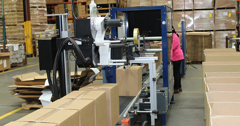Boxes on assembly line at Landaal Packaging Systems