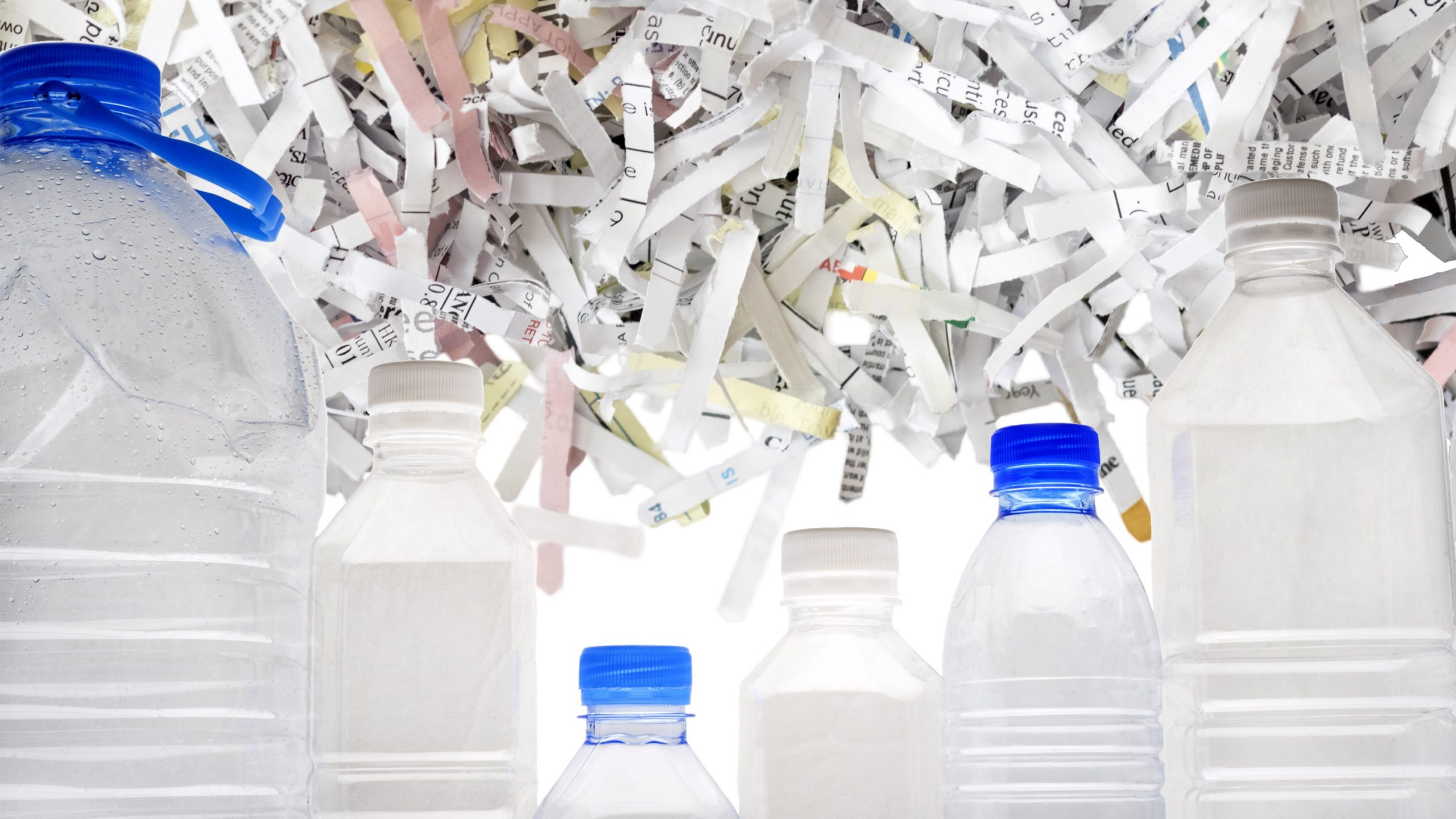 Shredded paper and water bottles for recycling