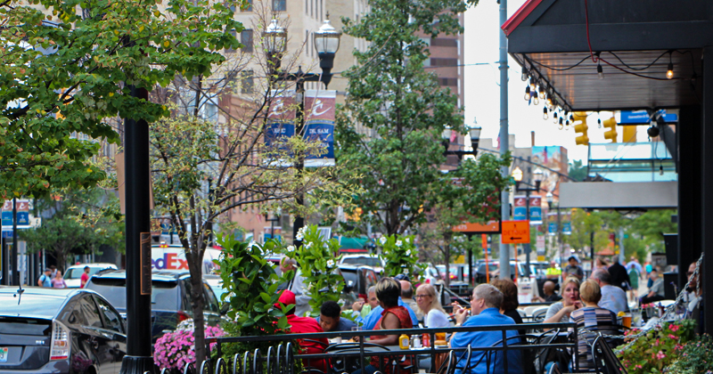 Customers enjoy outdoor eating in downtown Flint