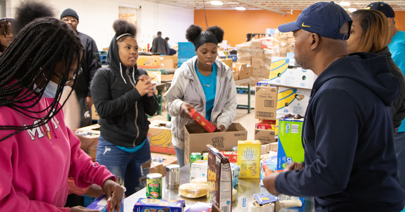 Volunteers work at the Food Bank