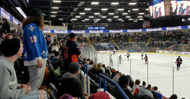 Fans cheer on the Flint Firebirds hockey team