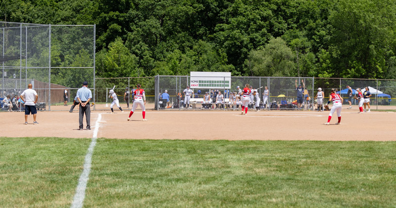 View of baseball diamond where two girls' softball teams are in play.