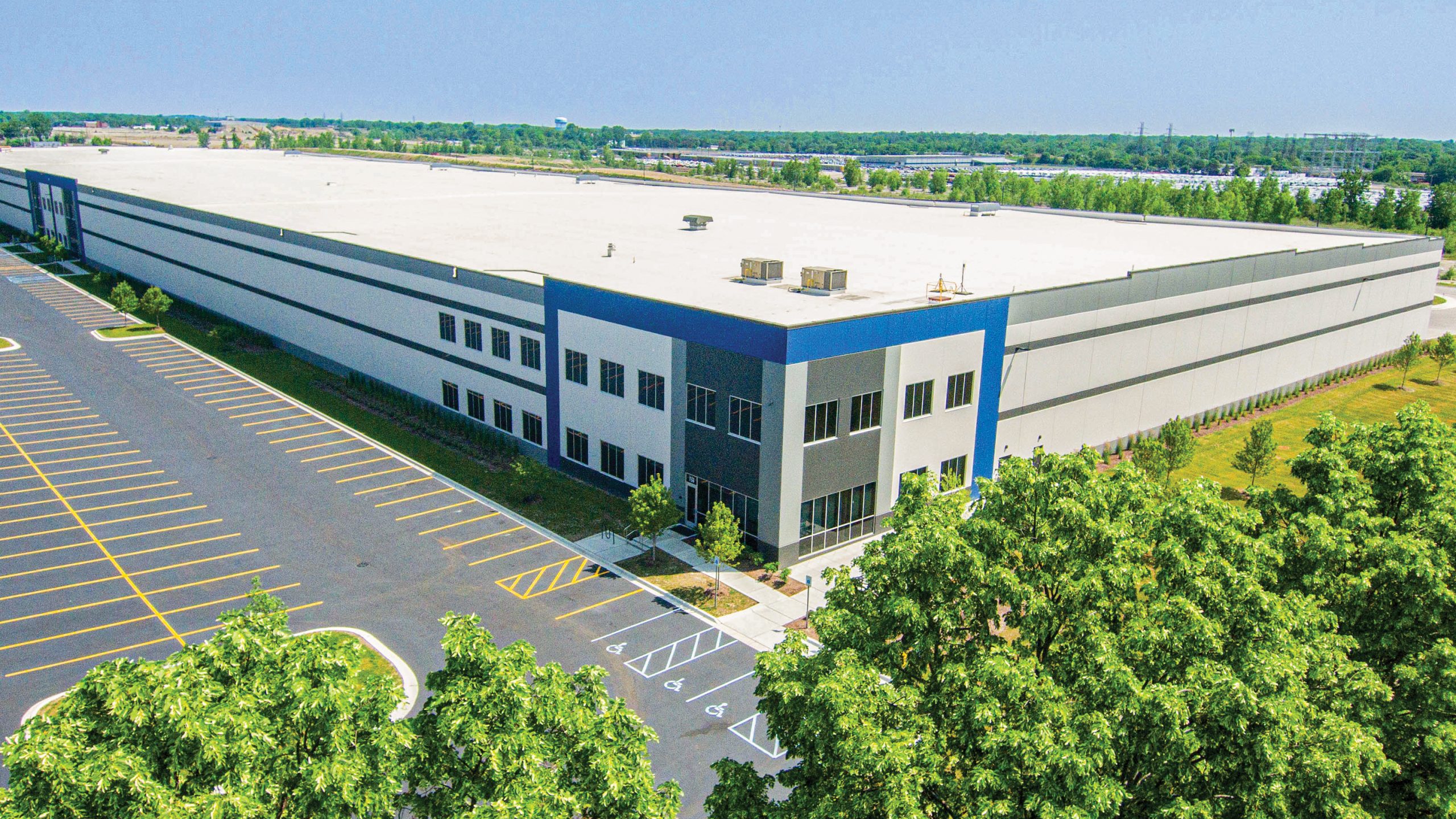 Flint Commerce Center, a large 2-story manufacturing plant, currently in development at the former Buick City site.